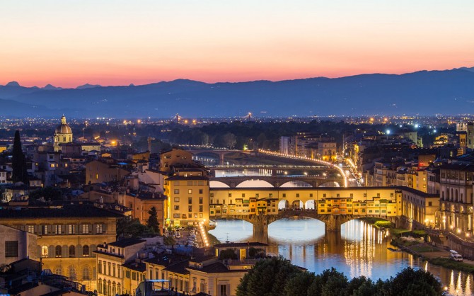 Florence, Arno River and Ponte Vecchio after sunset, Italy